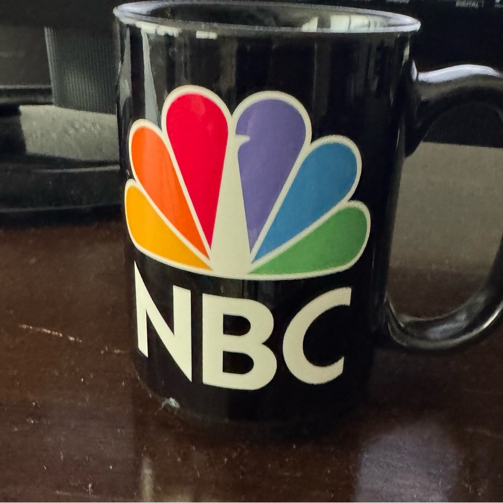 NBC universal peacock 2010 mug